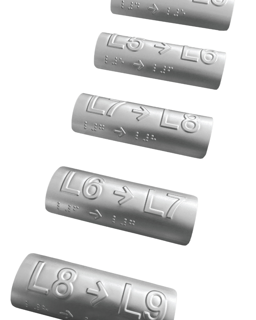 Curved silver level braille signs.