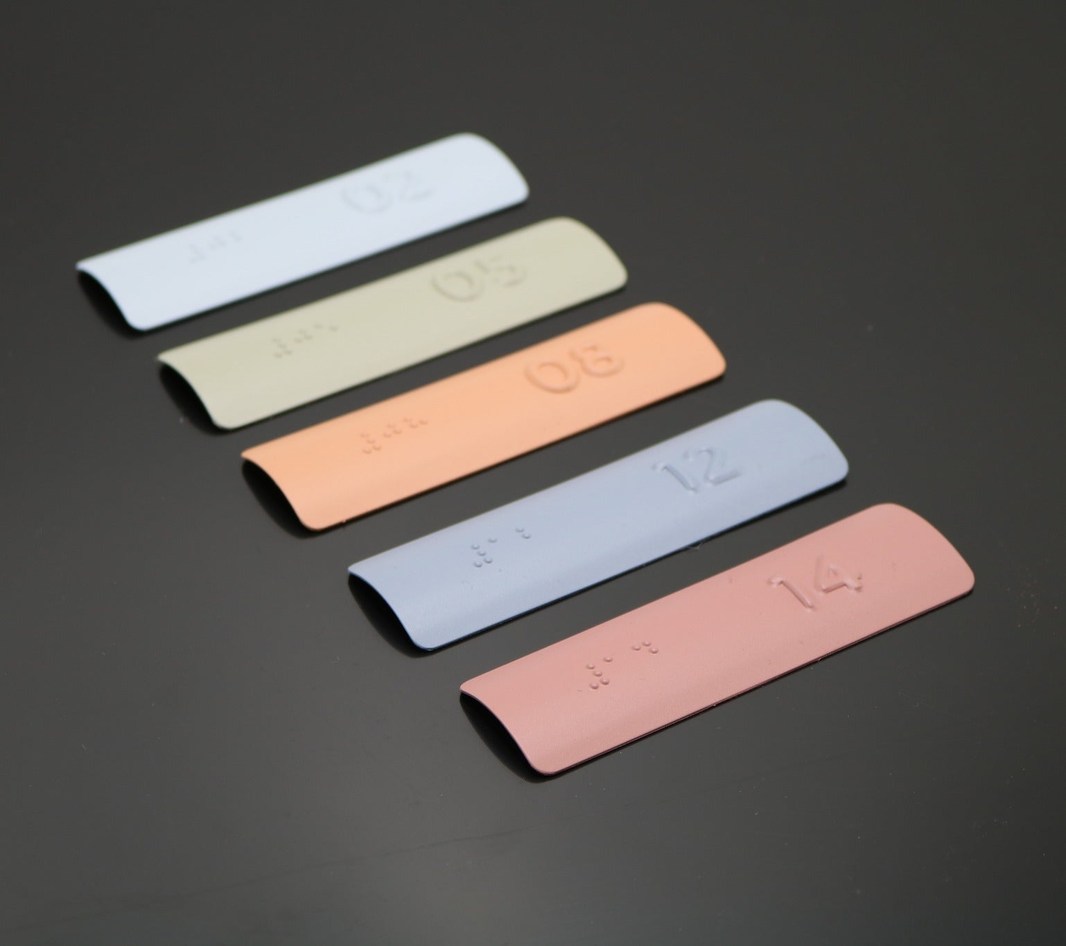 Set of pastel Braille Tactile Handrail Indicators