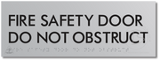 FIRE SAFETY DOOR DO NOT OBSTRUCT
