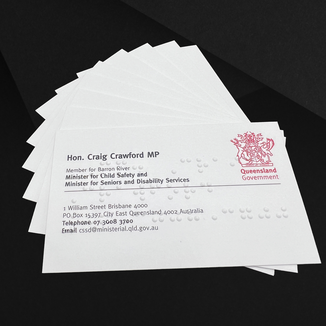 Stack of braille business cards.