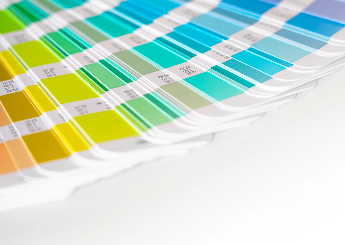 Color swatch chart with various colors on a white background