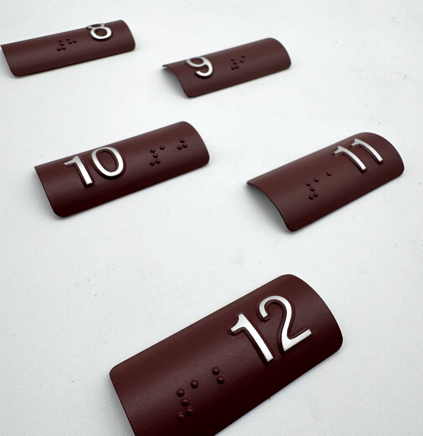 Set of brown Braille Tactile Handrail Indicators